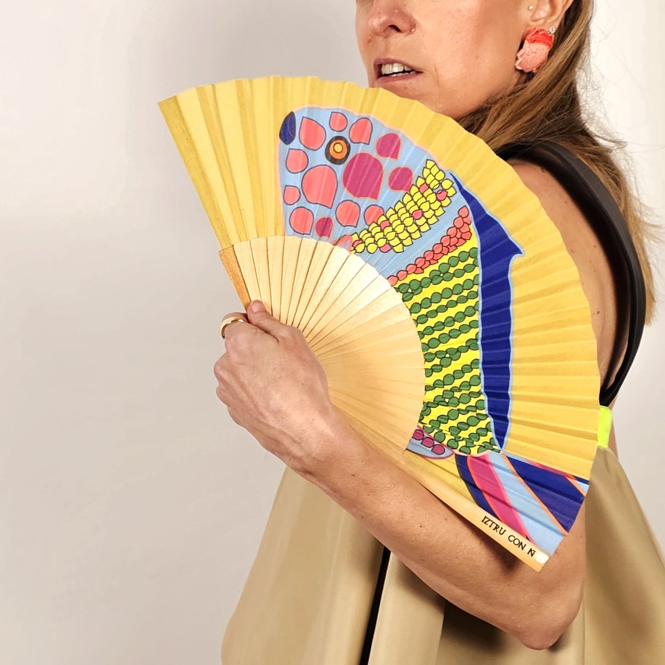 Abanico Pez verde pavo