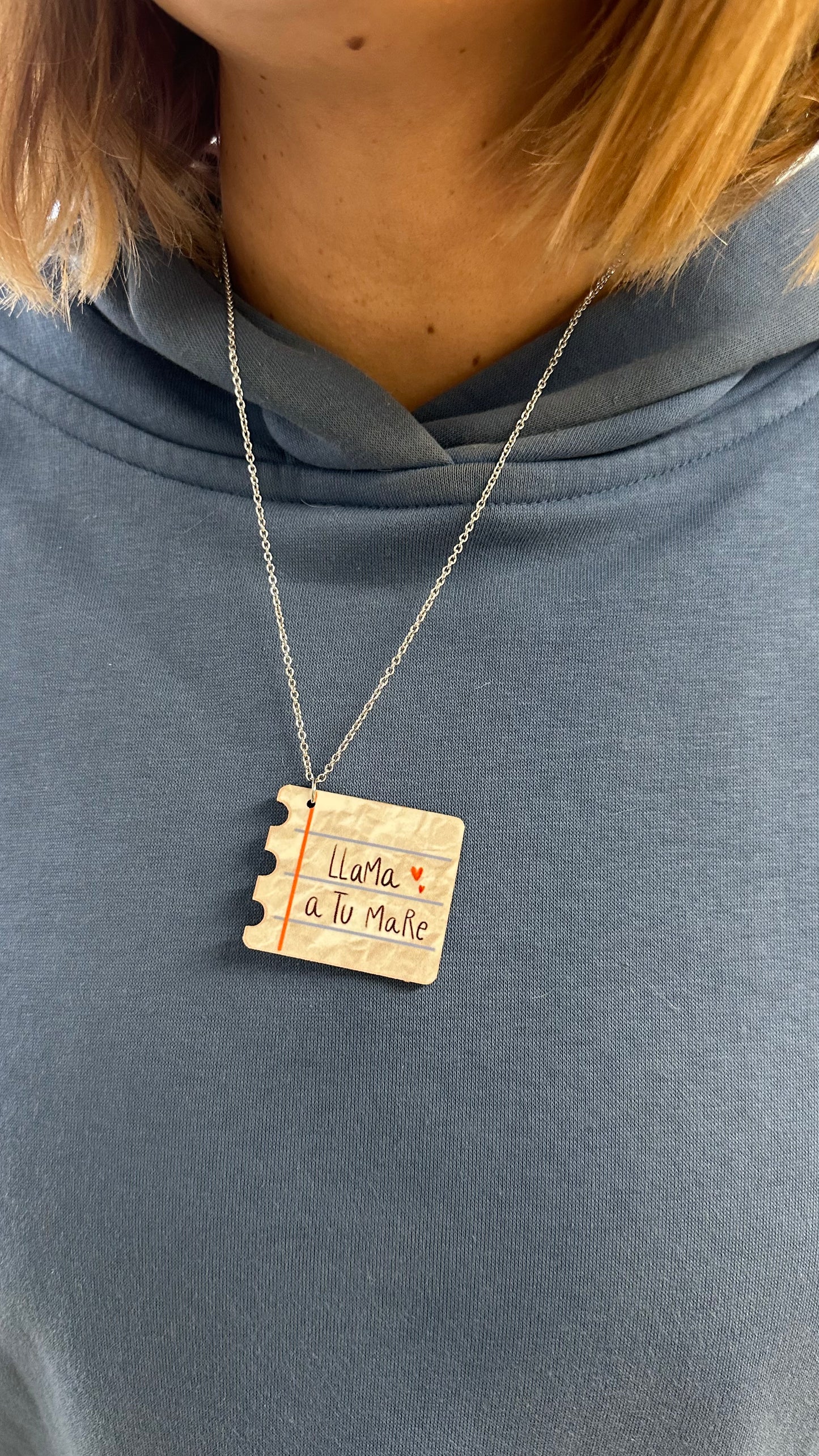 Collar "Killa, llama a tu mare" notas