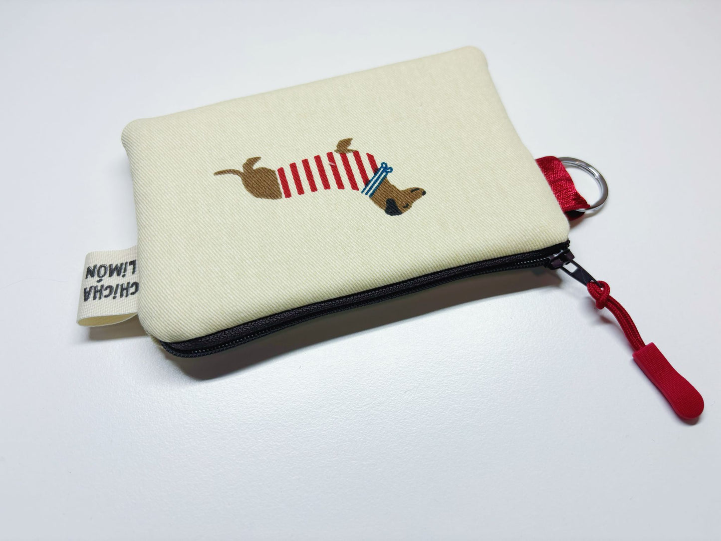 Monedero perro salchicha cierre rojo