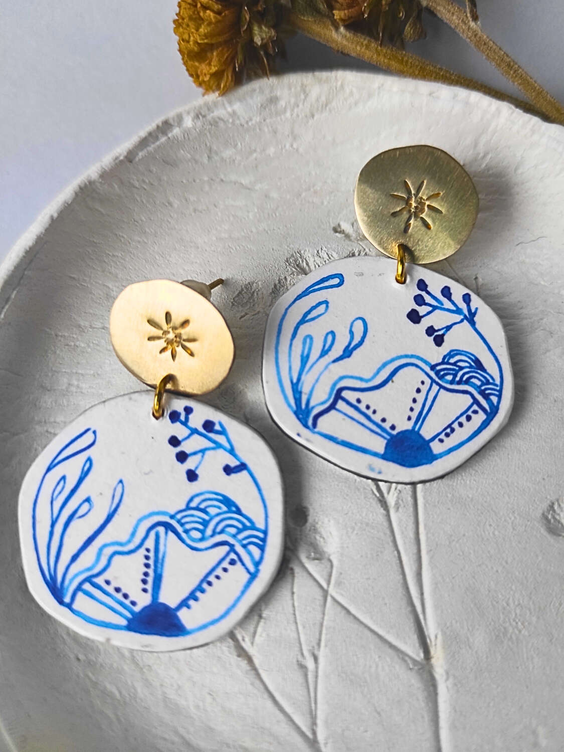 Pendientes mar- Cartón reciclado