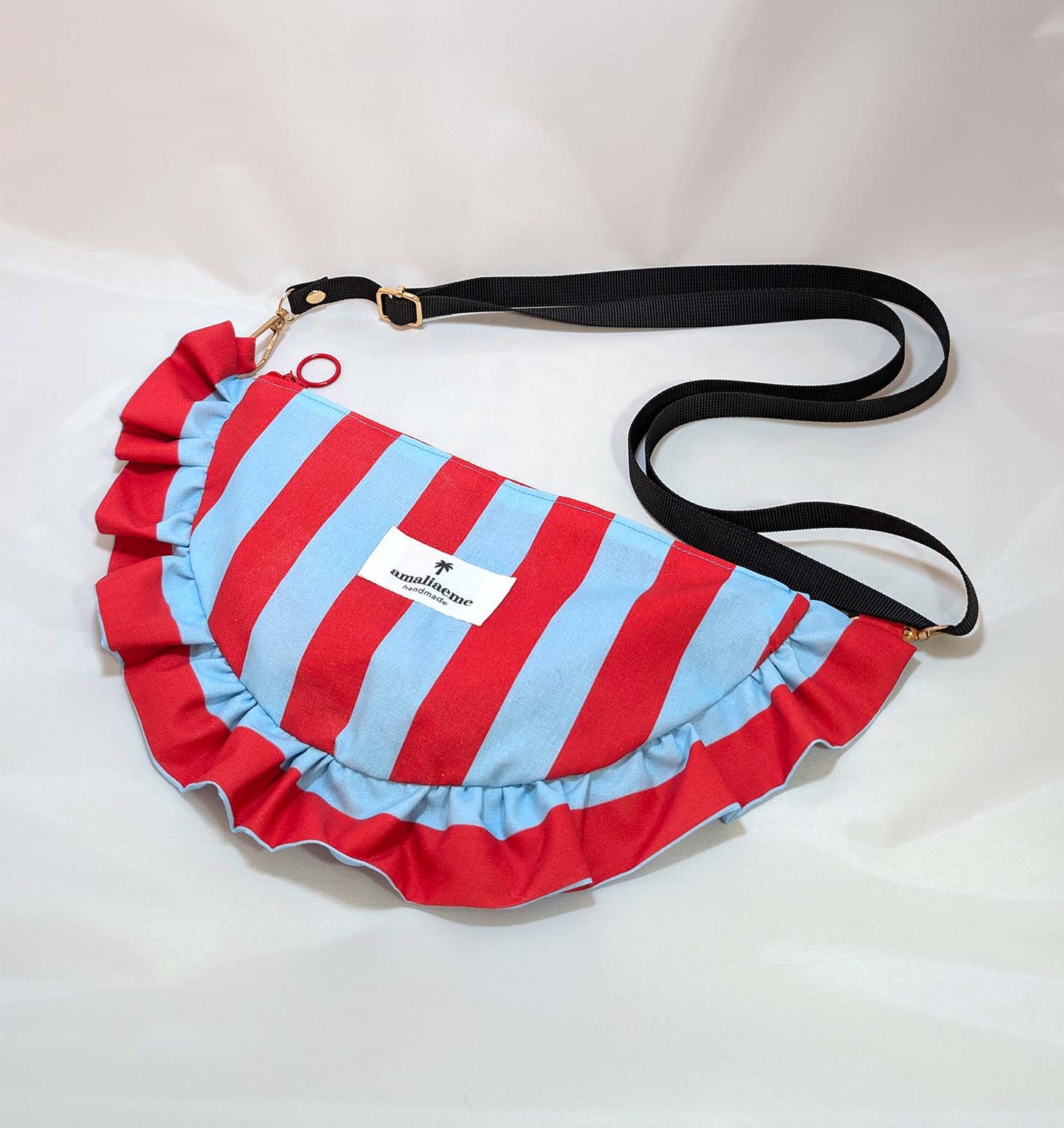 Bolsos de rayas de colores media luna
