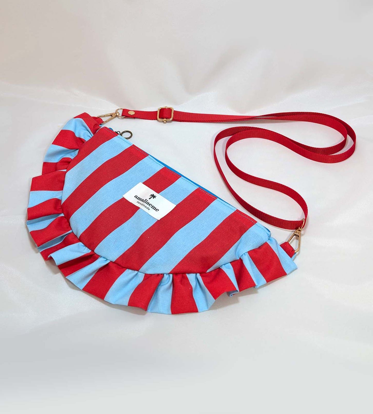 Bolsos de rayas de colores media luna