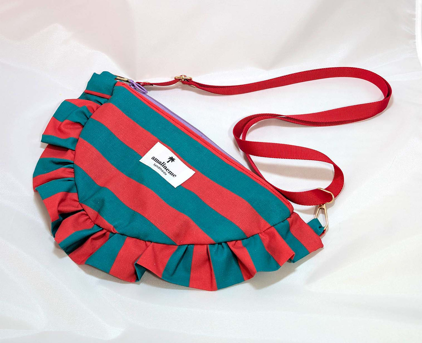 Bolsos de rayas de colores media luna