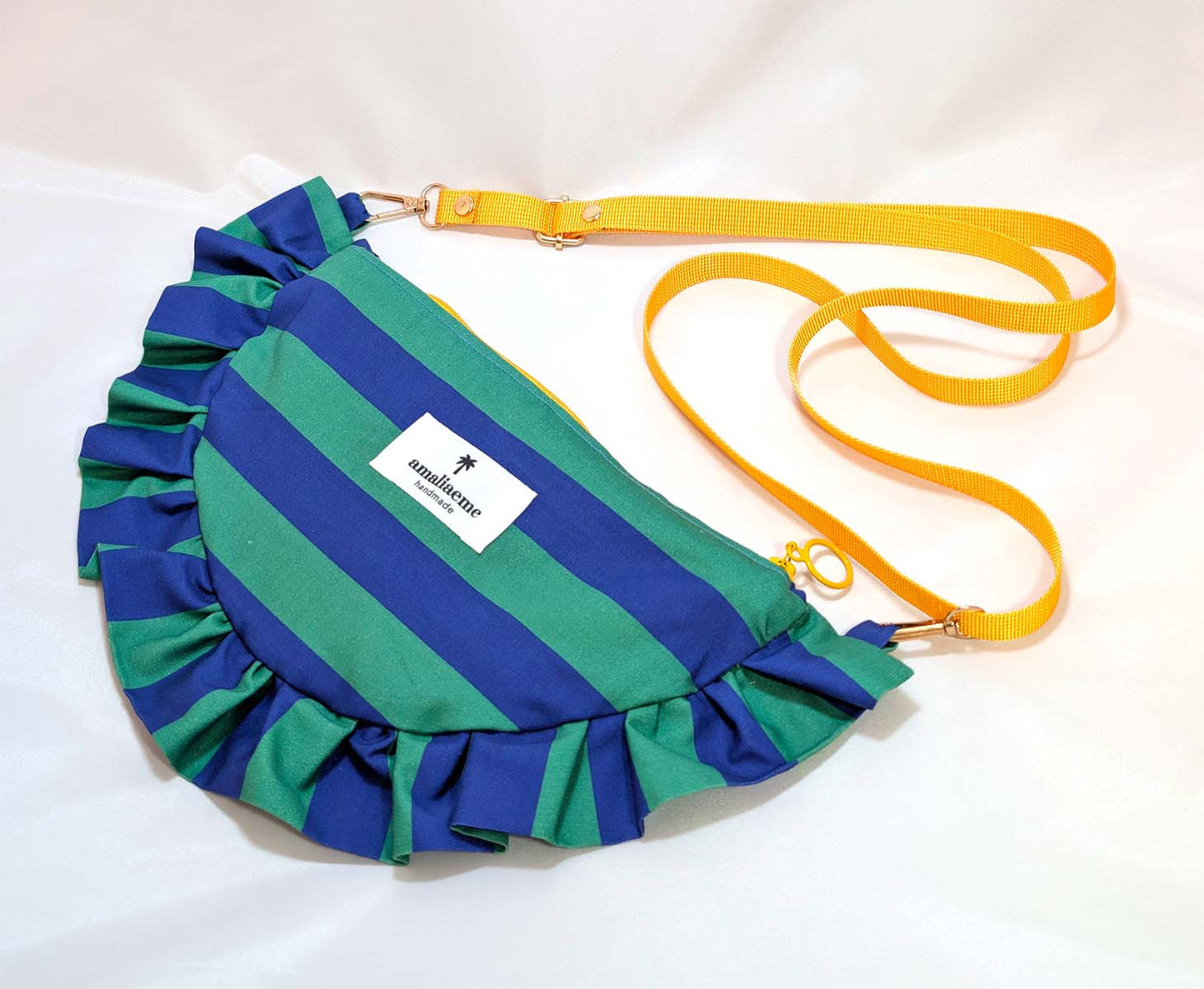 Bolsos de rayas de colores media luna