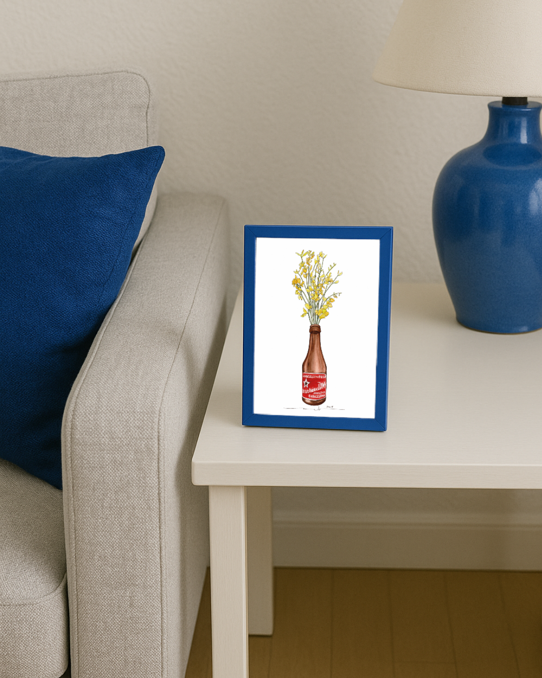 Lámina Botellín Estrella Damm con flores amarillas (ginesta)