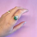 Anillo gota con flores azules (dorado)