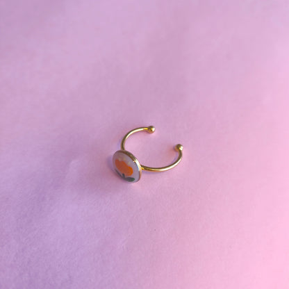Anillo redondo con flor naranja (dorado)