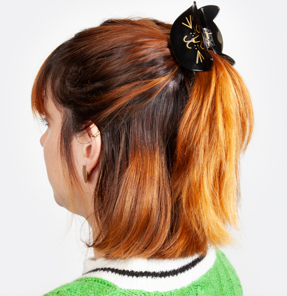 Pinza con forma de cara de gato