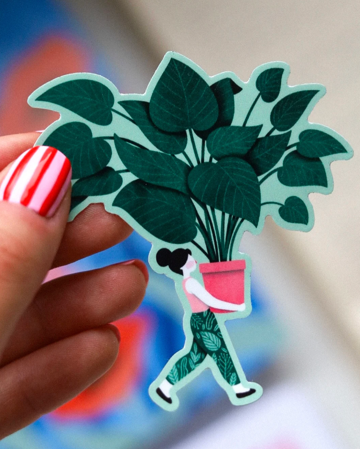 Pegatina vinilo chica con planta