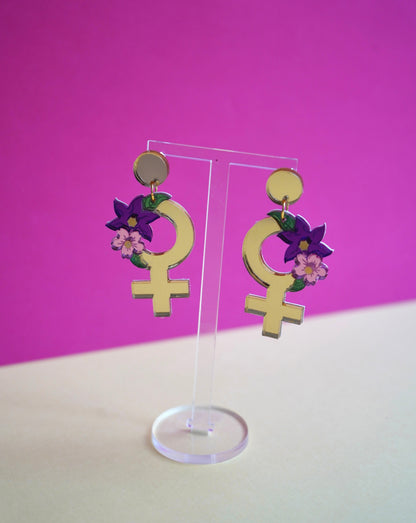Pendientes símbolo de la mujer