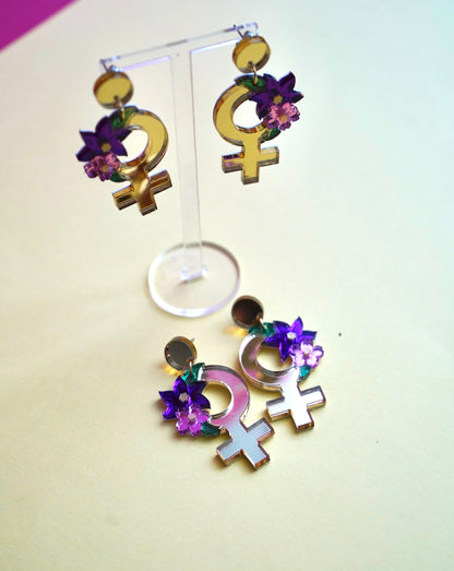 Pendientes símbolo de la mujer