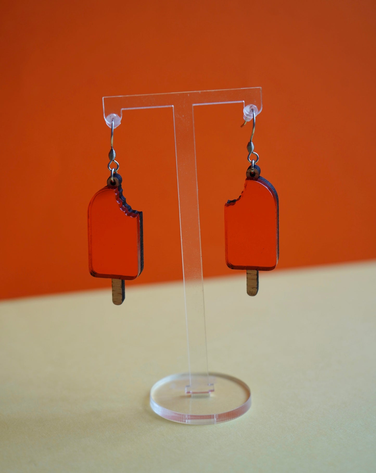Pendientes polo naranja helado