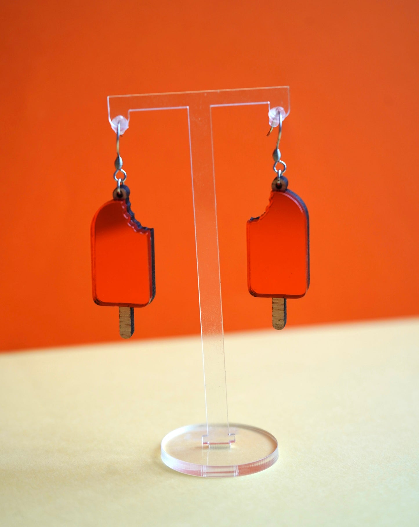 Pendientes polo naranja helado
