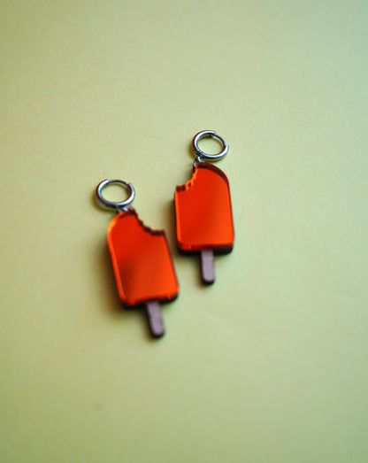 Pendientes polo naranja helado