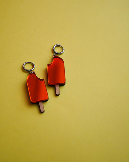 Pendientes polo naranja helado