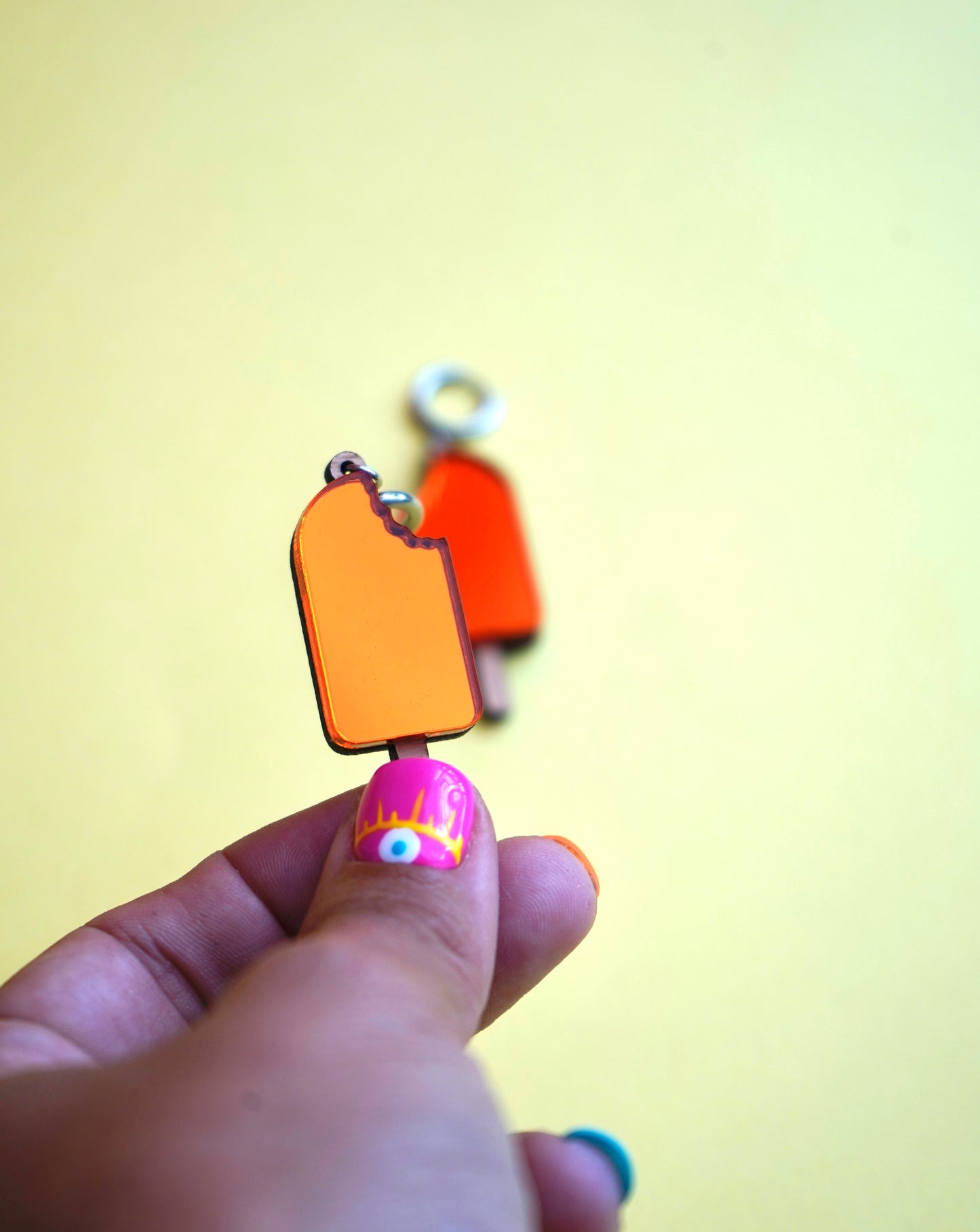 Pendientes polo naranja helado