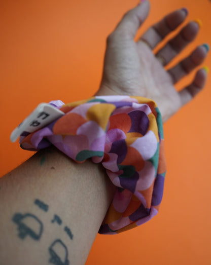 Coletero escamas de colores