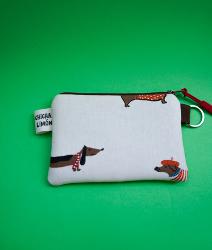 Monedero perros salchicha gorritos