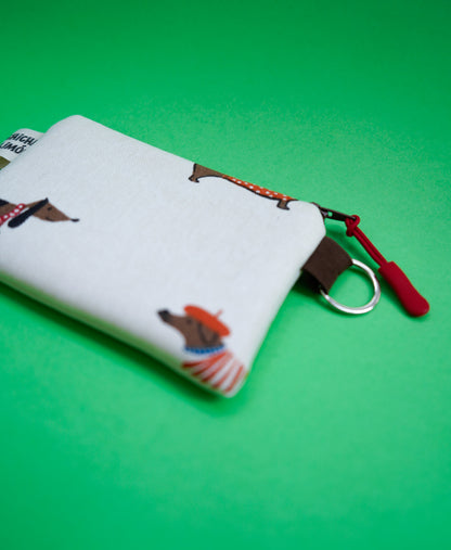 Monedero perros salchicha gorritos