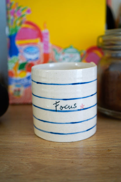 Taza notas FOCUS