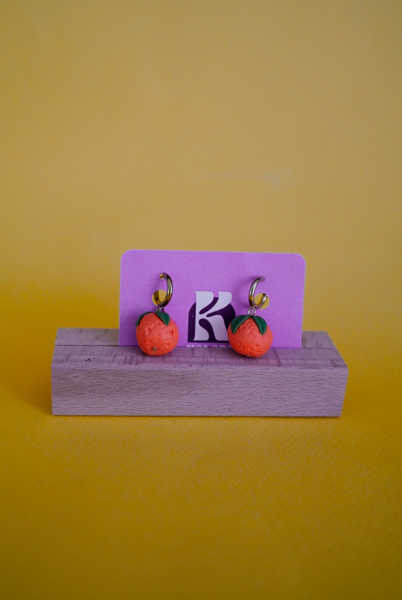 Pendientes de naranjas
