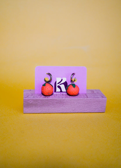 Pendientes de naranjas