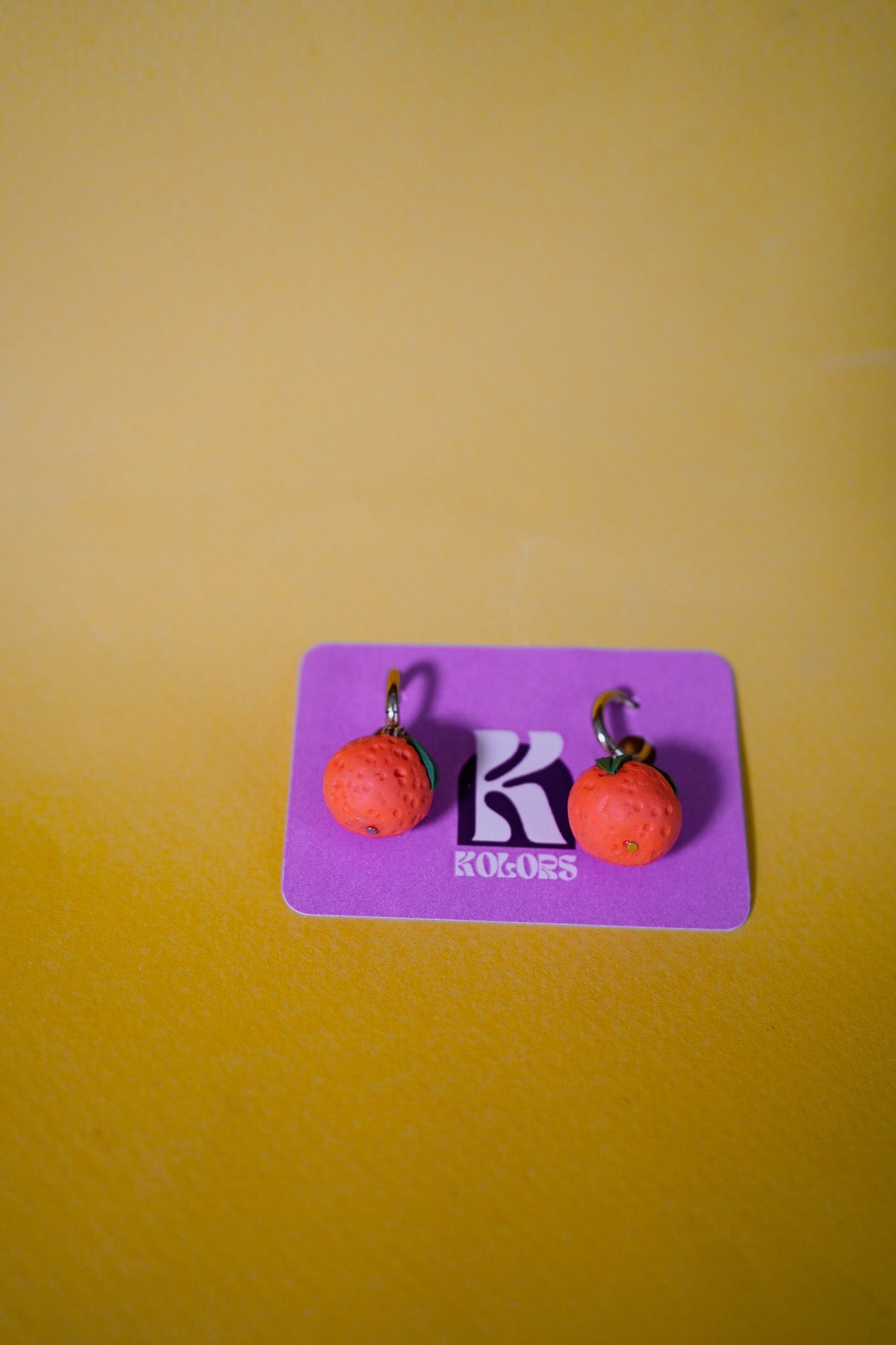 Pendientes de naranjas