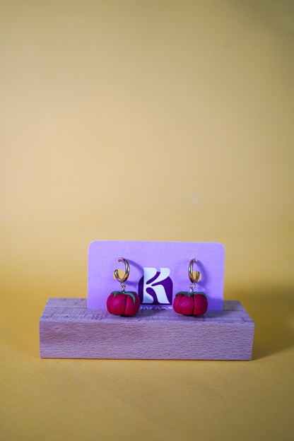 Pendientes de tomates