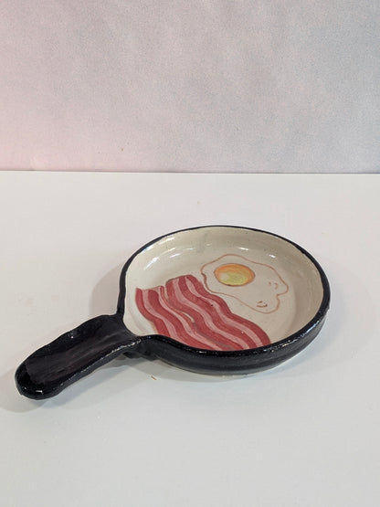 Sartén cerámica reposa cucharas