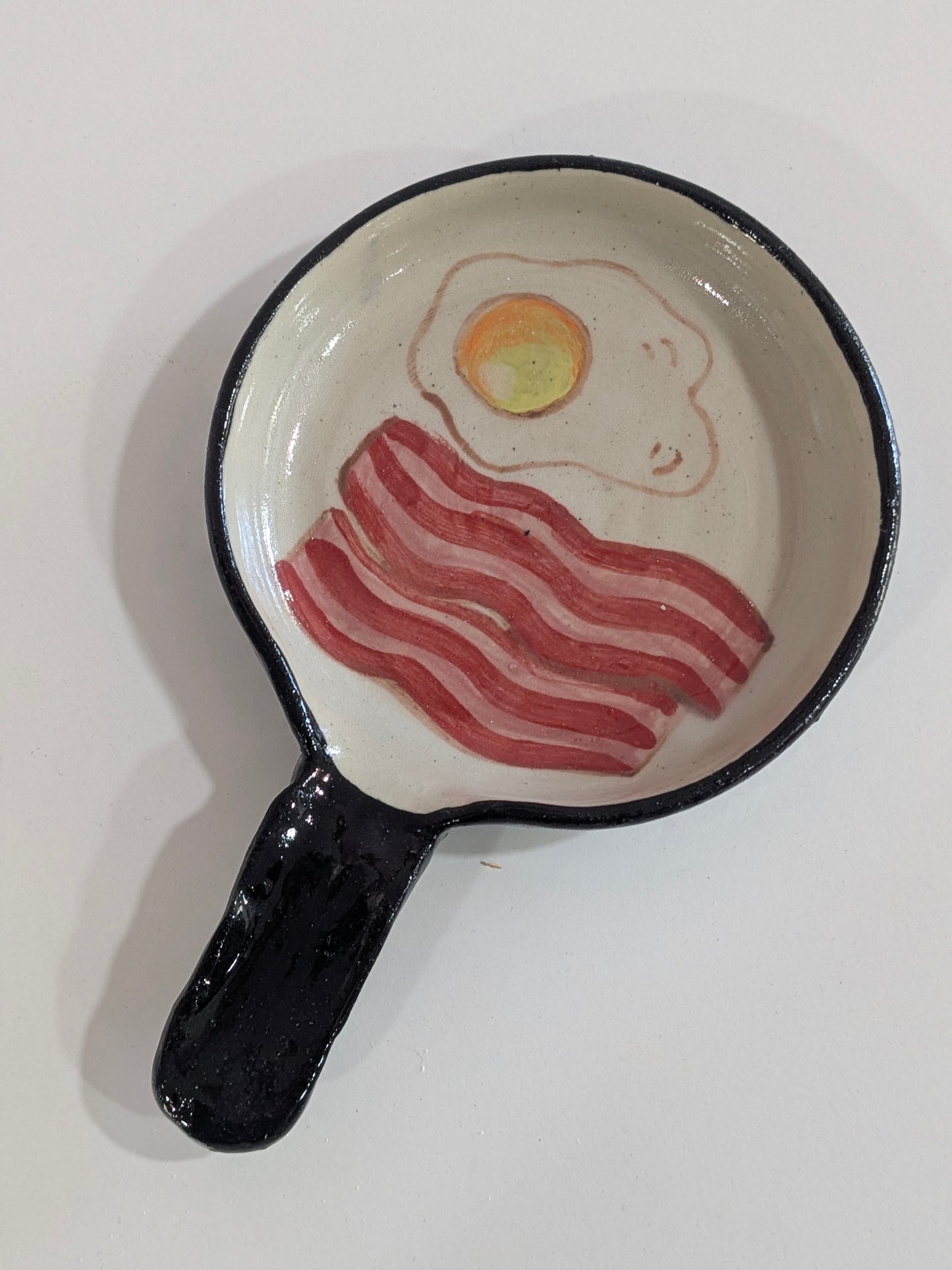 Sartén cerámica reposa cucharas