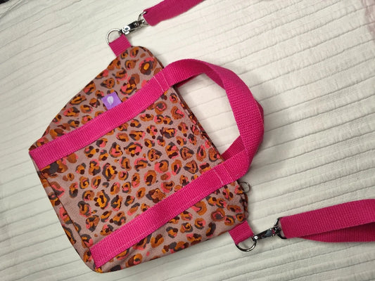 Bolso leopardo asas rosas