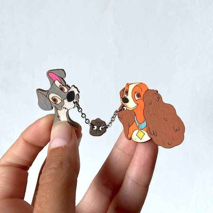 Broche colgante: Dama y vagabundo